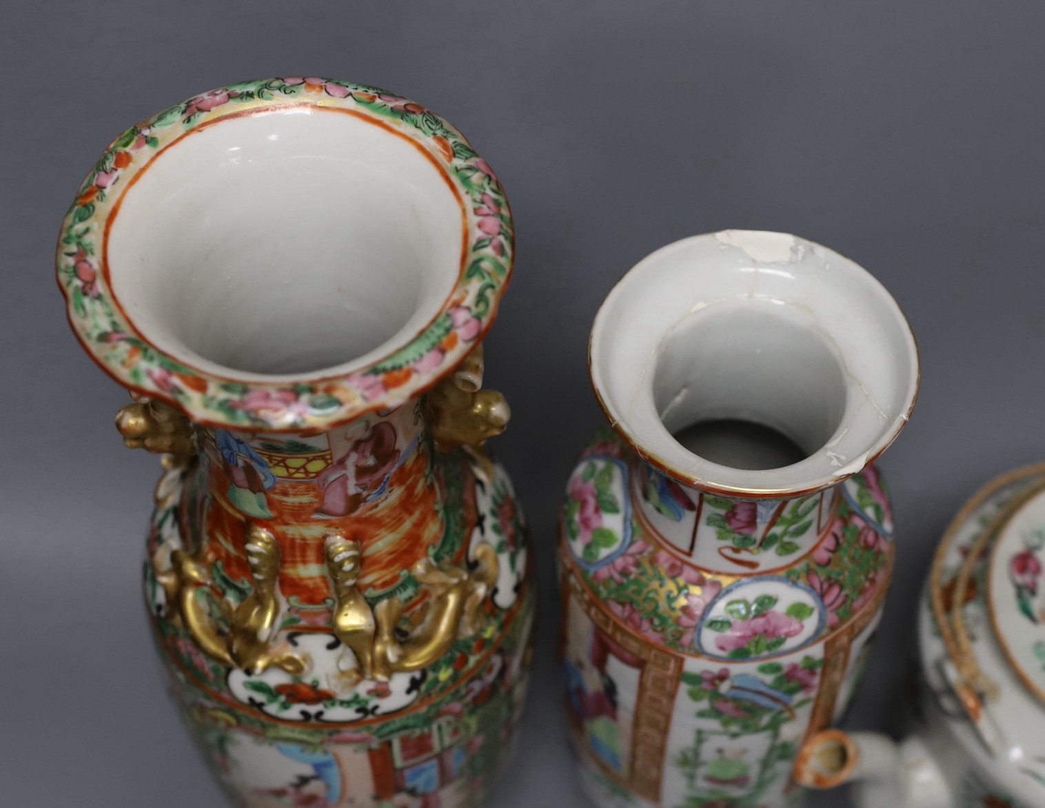 Three Chinese famille rose vases and a teapot, late 19th/early 20th century, tallest vase 29.5 cms high